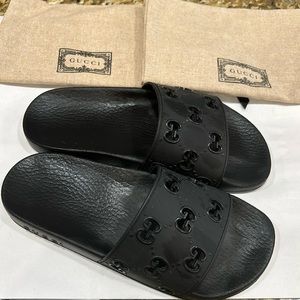 New Gucci slides with bags. Never used.